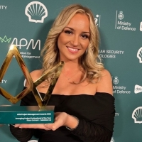 Kiara Orchard accepting award