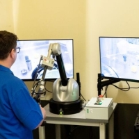 A world first demonstration of a robotic arm being operated inside a glovebox at Sellafield Ltd